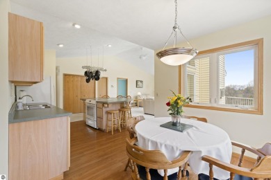 Nice 2 bedroom, 2 bath home that has seasonal views of Crystal on Crystal Lake Golf Club in Michigan - for sale on GolfHomes.com, golf home, golf lot