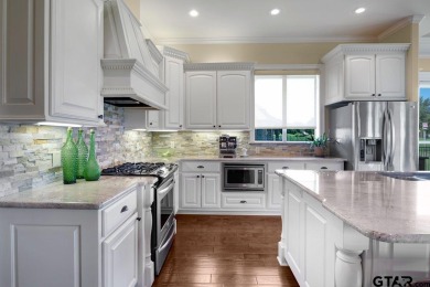 Discover an exceptional residence where sophisticated living on Hide-A-Way Lake Golf Course in Texas - for sale on GolfHomes.com, golf home, golf lot