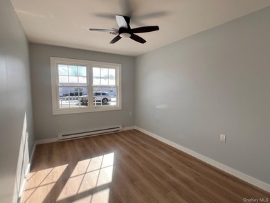 Reimagined. Elevated to a new level. This completely transformed on Leisure Village Golf Course in New York - for sale on GolfHomes.com, golf home, golf lot