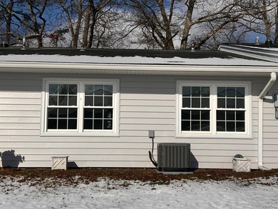 Reimagined. Elevated to a new level. This completely transformed on Leisure Village Golf Course in New York - for sale on GolfHomes.com, golf home, golf lot