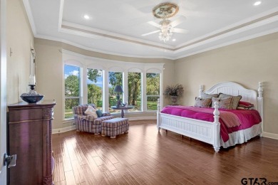 Discover an exceptional residence where sophisticated living on Hide-A-Way Lake Golf Course in Texas - for sale on GolfHomes.com, golf home, golf lot