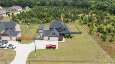 Welcome to your dream home! Nestled on nearly half an acre (.46) on Cypress Lakes Golf Course in North Carolina - for sale on GolfHomes.com, golf home, golf lot