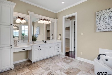 Discover an exceptional residence where sophisticated living on Hide-A-Way Lake Golf Course in Texas - for sale on GolfHomes.com, golf home, golf lot