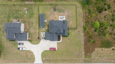 Welcome to your dream home! Nestled on nearly half an acre (.46) on Cypress Lakes Golf Course in North Carolina - for sale on GolfHomes.com, golf home, golf lot