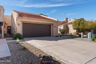 Wow! If you are looking to have a great town home on the golf on London Bridge Golf Course in Arizona - for sale on GolfHomes.com, golf home, golf lot