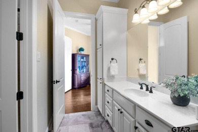 Discover an exceptional residence where sophisticated living on Hide-A-Way Lake Golf Course in Texas - for sale on GolfHomes.com, golf home, golf lot