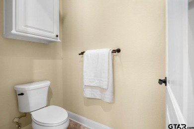Discover an exceptional residence where sophisticated living on Hide-A-Way Lake Golf Course in Texas - for sale on GolfHomes.com, golf home, golf lot