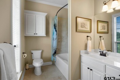 Discover an exceptional residence where sophisticated living on Hide-A-Way Lake Golf Course in Texas - for sale on GolfHomes.com, golf home, golf lot
