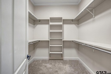 Discover an exceptional residence where sophisticated living on Hide-A-Way Lake Golf Course in Texas - for sale on GolfHomes.com, golf home, golf lot