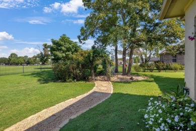 Discover an exceptional residence where sophisticated living on Hide-A-Way Lake Golf Course in Texas - for sale on GolfHomes.com, golf home, golf lot