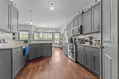 Welcome to your dream home! Nestled on nearly half an acre (.46) on Cypress Lakes Golf Course in North Carolina - for sale on GolfHomes.com, golf home, golf lot