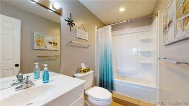 LAKE OF THE OZARKS | TOP-FLOOR CONDOMINIUM Enjoy breathtaking on The Oaks Golf Course in Missouri - for sale on GolfHomes.com, golf home, golf lot