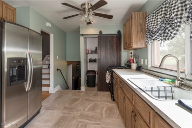 Welcome to 6921 Hollywood Dr in Parma, a lovely split-level home on Ridgewood Golf Course in Ohio - for sale on GolfHomes.com, golf home, golf lot