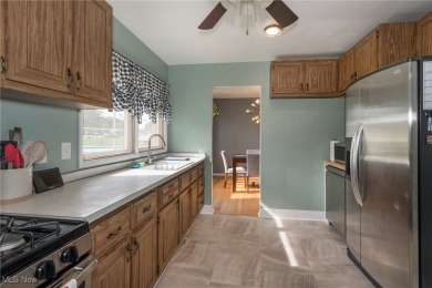 Welcome to 6921 Hollywood Dr in Parma, a lovely split-level home on Ridgewood Golf Course in Ohio - for sale on GolfHomes.com, golf home, golf lot