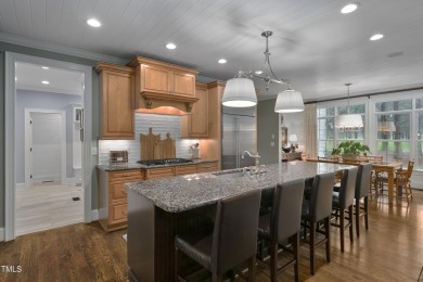 This picturesque Southern Living home has breathtaking panoramic on Heritage Golf Club in North Carolina - for sale on GolfHomes.com, golf home, golf lot
