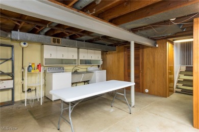 Welcome to 6921 Hollywood Dr in Parma, a lovely split-level home on Ridgewood Golf Course in Ohio - for sale on GolfHomes.com, golf home, golf lot