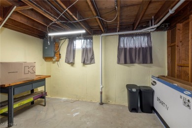 Welcome to 6921 Hollywood Dr in Parma, a lovely split-level home on Ridgewood Golf Course in Ohio - for sale on GolfHomes.com, golf home, golf lot