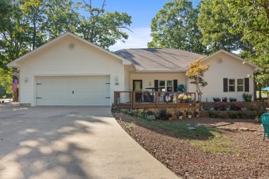 This gorgeous home, located on the 3rd hole of the Indian Hills on Indian Hills Country Club in Arkansas - for sale on GolfHomes.com, golf home, golf lot