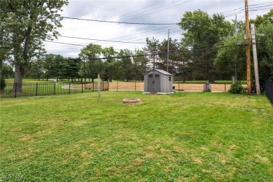 Welcome to 6921 Hollywood Dr in Parma, a lovely split-level home on Ridgewood Golf Course in Ohio - for sale on GolfHomes.com, golf home, golf lot
