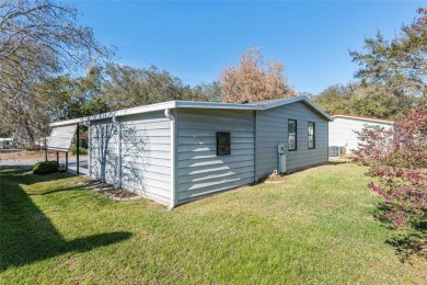 Welcome to this COMPLETELY UPDATED home in Orange Blossom, The on Orange Blossom Hills Golf and Country Club in Florida - for sale on GolfHomes.com, golf home, golf lot