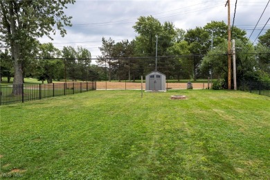 Welcome to 6921 Hollywood Dr in Parma, a lovely split-level home on Ridgewood Golf Course in Ohio - for sale on GolfHomes.com, golf home, golf lot