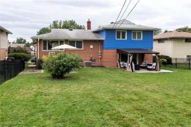 Welcome to 6921 Hollywood Dr in Parma, a lovely split-level home on Ridgewood Golf Course in Ohio - for sale on GolfHomes.com, golf home, golf lot