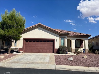 This beautiful home is well lit with many windows and an open on Ashwood Golf Course in California - for sale on GolfHomes.com, golf home, golf lot