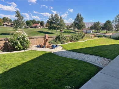 This beautiful home is well lit with many windows and an open on Ashwood Golf Course in California - for sale on GolfHomes.com, golf home, golf lot