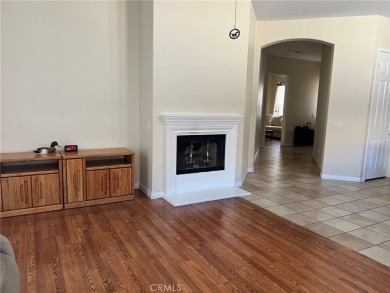 This beautiful home is well lit with many windows and an open on Ashwood Golf Course in California - for sale on GolfHomes.com, golf home, golf lot