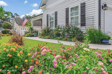 Welcome to 8861 Nottoway Drive in Calabash-a beautiful custom on Brunswick Plantation and Golf Resorts in North Carolina - for sale on GolfHomes.com, golf home, golf lot