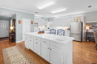 Beautiful home with stunning views is located on hole 16 of the on Hollytree Country Club in Texas - for sale on GolfHomes.com, golf home, golf lot