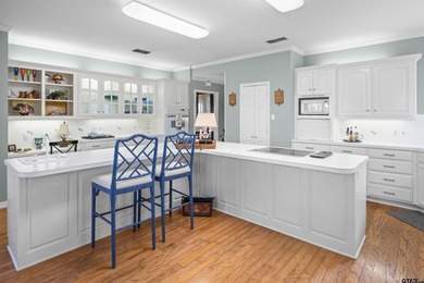 Beautiful home with stunning views is located on hole 16 of the on Hollytree Country Club in Texas - for sale on GolfHomes.com, golf home, golf lot