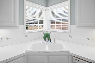 Beautiful home with stunning views is located on hole 16 of the on Hollytree Country Club in Texas - for sale on GolfHomes.com, golf home, golf lot