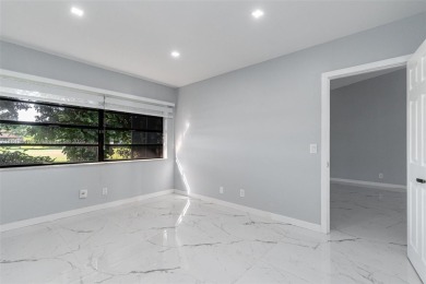 Great villa on the golf course, beautifully updated new kitchen on Colony West Country Club in Florida - for sale on GolfHomes.com, golf home, golf lot