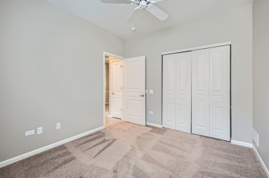 POPULAR CATIGNY MODEL w/sunroom! Large living room/dining room on Whisper Creek Golf Club in Illinois - for sale on GolfHomes.com, golf home, golf lot
