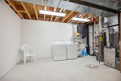 Check out this Spacious Main Level Living Townhome on a secluded on Eagle Lake Golf Center in Minnesota - for sale on GolfHomes.com, golf home, golf lot