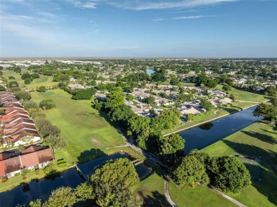Great villa on the golf course, beautifully updated new kitchen on Colony West Country Club in Florida - for sale on GolfHomes.com, golf home, golf lot