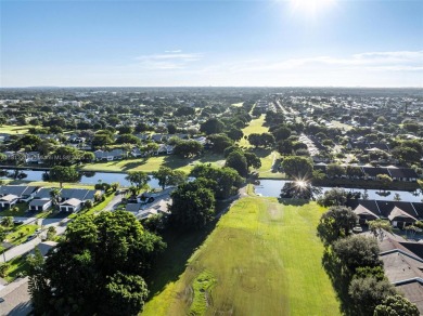 Great villa on the golf course, beautifully updated new kitchen on Colony West Country Club in Florida - for sale on GolfHomes.com, golf home, golf lot