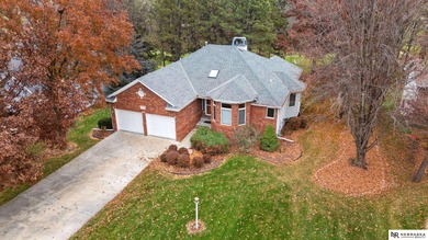 Experience the warmth of a close-knit neighborhood of around 100 on Woodland Hills Golf Course in Nebraska - for sale on GolfHomes.com, golf home, golf lot