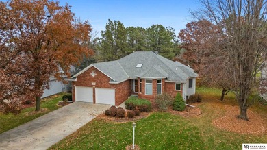 Experience the warmth of a close-knit neighborhood of around 100 on Woodland Hills Golf Course in Nebraska - for sale on GolfHomes.com, golf home, golf lot