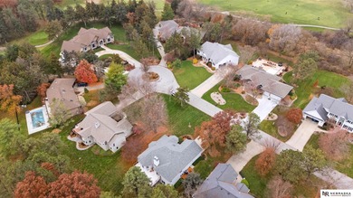 Experience the warmth of a close-knit neighborhood of around 100 on Woodland Hills Golf Course in Nebraska - for sale on GolfHomes.com, golf home, golf lot