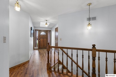 Experience the warmth of a close-knit neighborhood of around 100 on Woodland Hills Golf Course in Nebraska - for sale on GolfHomes.com, golf home, golf lot