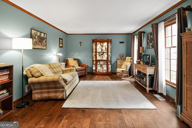 Welcome to this beautifully maintained Colonial-style brick home on West Pines Golf Club in Georgia - for sale on GolfHomes.com, golf home, golf lot