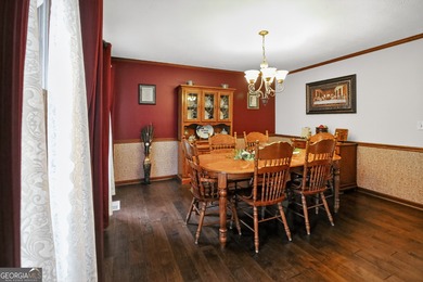 Welcome to this beautifully maintained Colonial-style brick home on West Pines Golf Club in Georgia - for sale on GolfHomes.com, golf home, golf lot