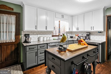 Welcome to this beautifully maintained Colonial-style brick home on West Pines Golf Club in Georgia - for sale on GolfHomes.com, golf home, golf lot