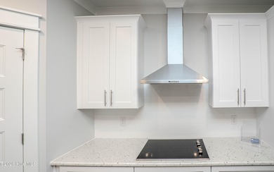 Location is everything, right? This brand new home is less than on Brick Landing Plantation Yacht and Golf Club in North Carolina - for sale on GolfHomes.com, golf home, golf lot