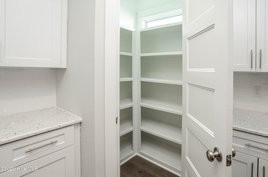 Location is everything, right? This brand new home is less than on Brick Landing Plantation Yacht and Golf Club in North Carolina - for sale on GolfHomes.com, golf home, golf lot