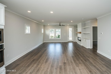 Location is everything, right? This brand new home is less than on Brick Landing Plantation Yacht and Golf Club in North Carolina - for sale on GolfHomes.com, golf home, golf lot