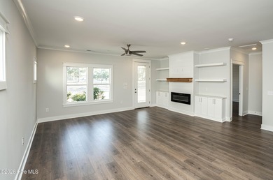 Location is everything, right? This brand new home is less than on Brick Landing Plantation Yacht and Golf Club in North Carolina - for sale on GolfHomes.com, golf home, golf lot