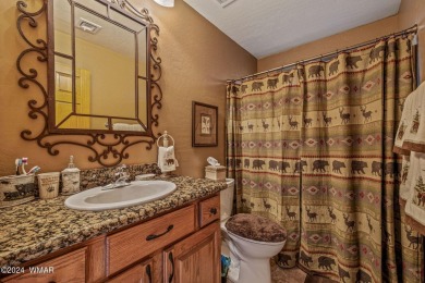 Immaculate condo, uniquely designed as a single-family residence on Pinetop Lakes Golf and Country Club in Arizona - for sale on GolfHomes.com, golf home, golf lot